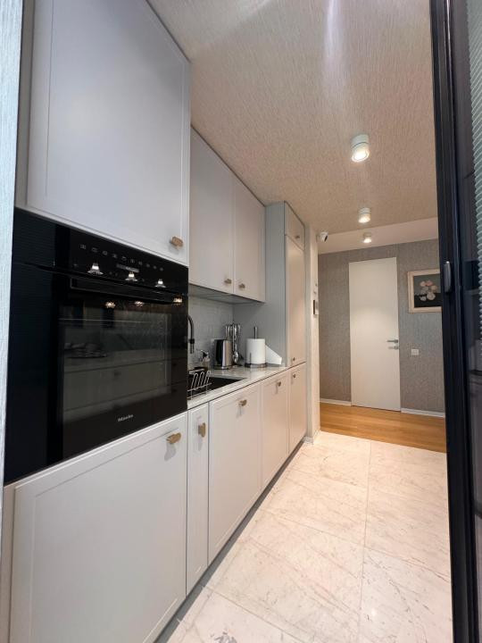 Duplex exclusivist cu grădină privată și terasă în zona Charles de Gaulle
